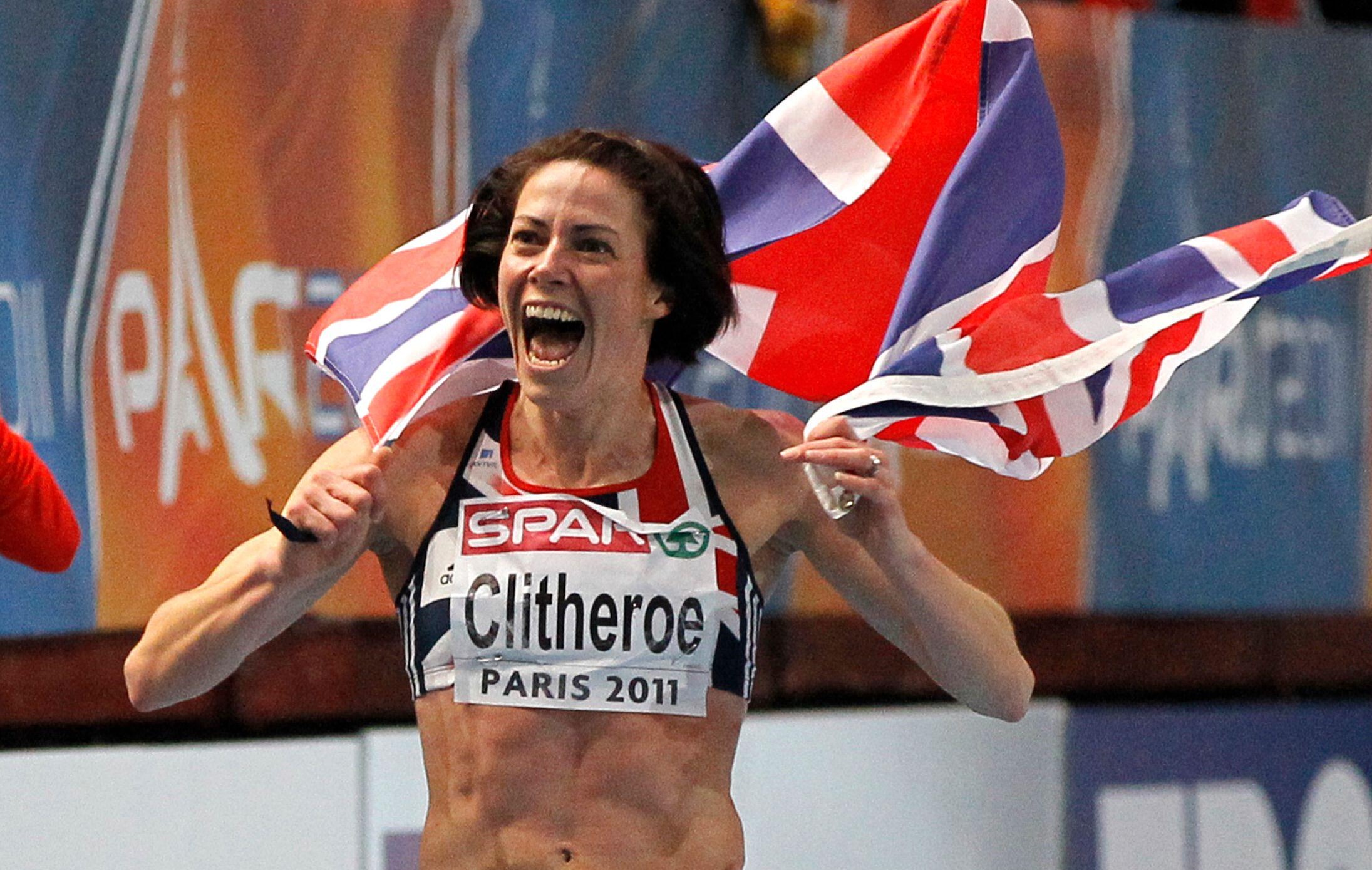 Britain’s Helen Clitheroe celebrates after winning the women’s 3000m final at the European Athletics indoor championships in Paris March 6, 2011. REUTERS/Charles Platiau (FRANCE – Tags: SPORT ATHLETICS)
